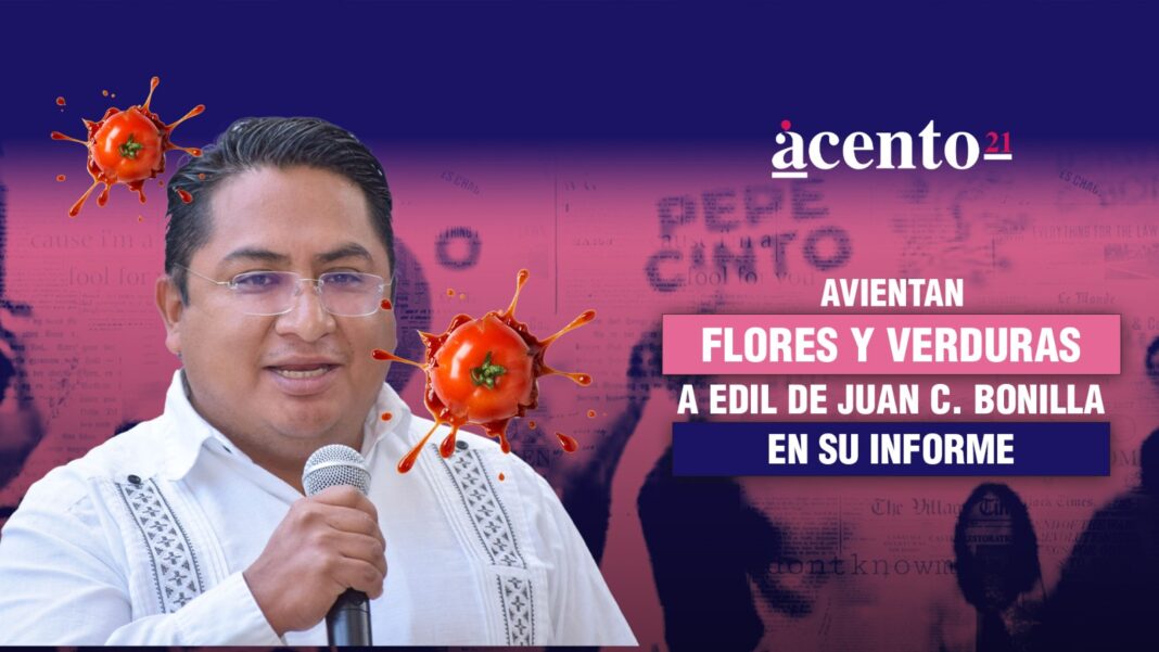 Avientan flores y verduras a edil de Juan C. Bonilla en su informe 